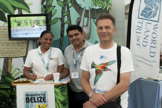 World Land Trust's stand at Birdfair 2015. Chris Packham with Vladimir Rodriguez and Therese Jonch from Programme for Belize. World Land Trust's stand at Birdfair 2015. Chris Packham with Vladimir Rodriguez and Therese Jonch from Programme for Belize.